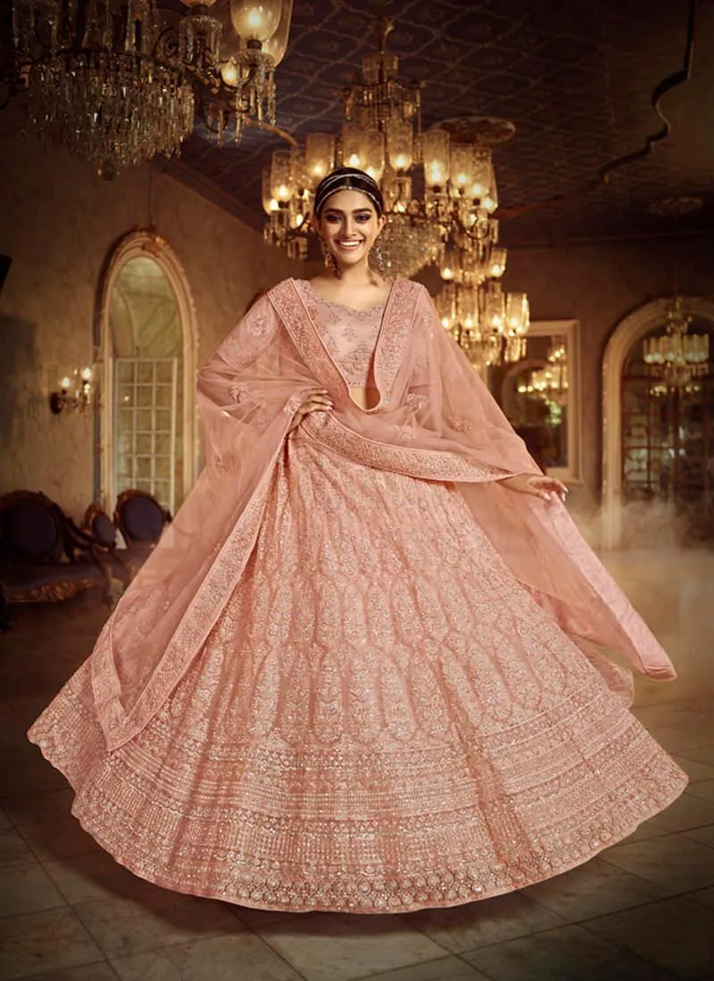 Alluring Peach Zarkan Dori Soft Net Lehenga Choli Set