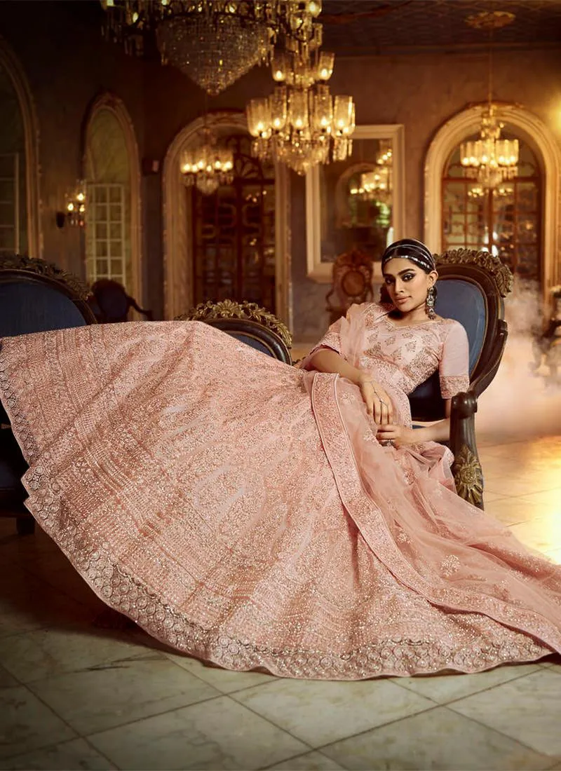 Alluring Peach Zarkan Dori Soft Net Lehenga Choli Set
