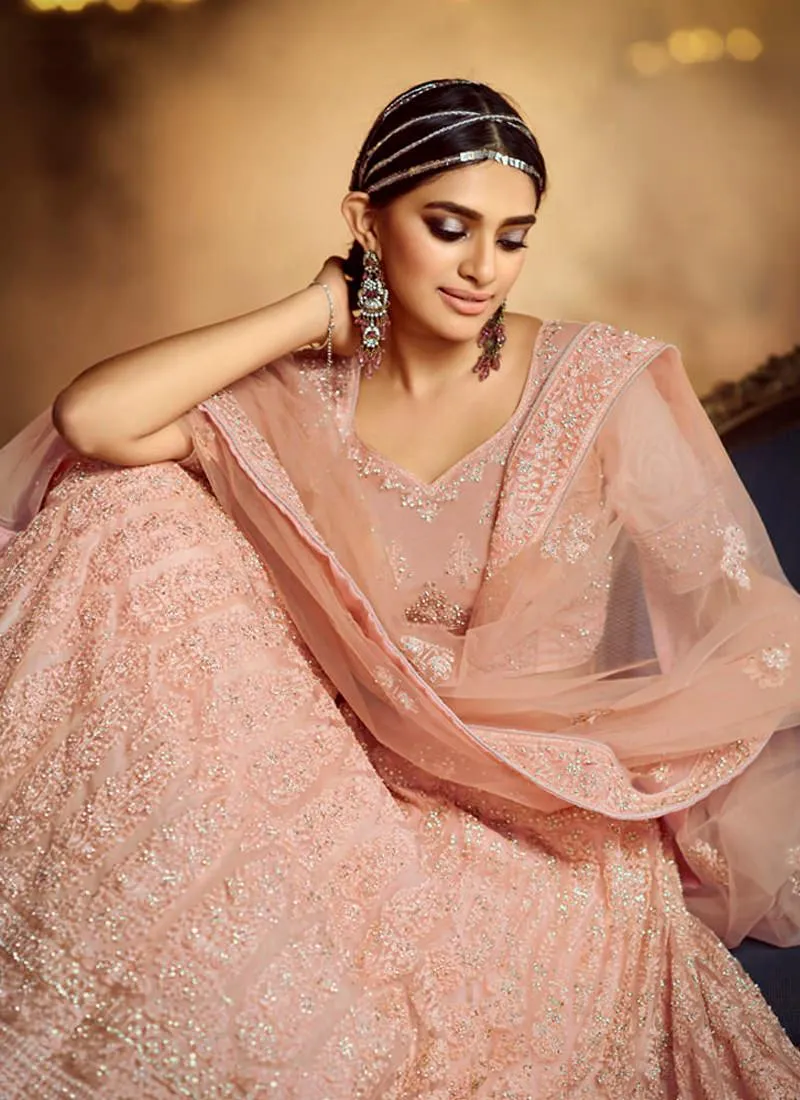 Alluring Peach Zarkan Dori Soft Net Lehenga Choli Set